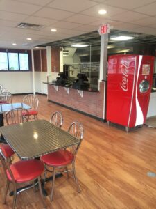 Restaurant kitchen interior after professional deep cleaning restoration